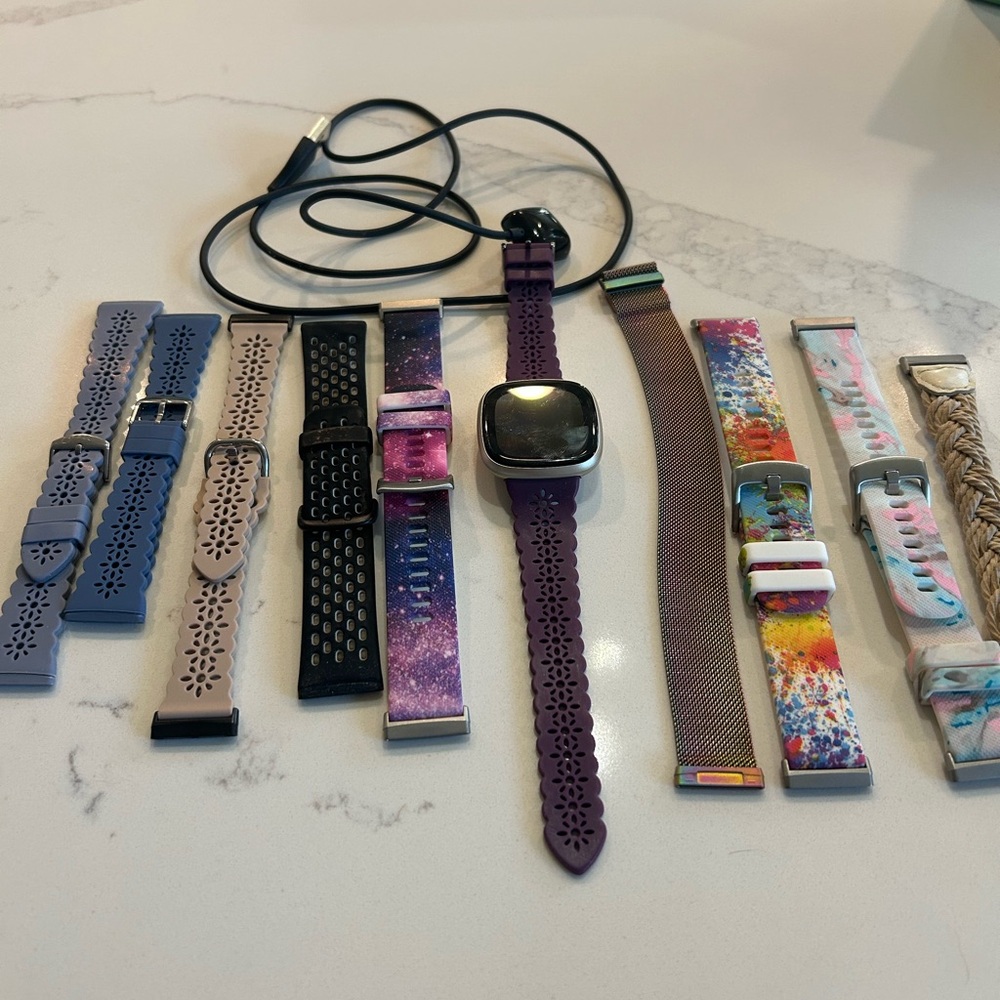 Fitbit versa 3 with 9 bands!